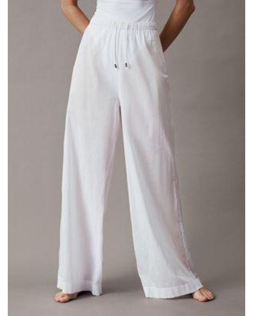 Pantalones de playa de algodón Calvin Klein de color White