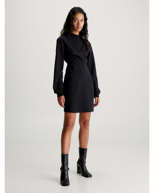 Robe portefeuille à manches longues en jersey Calvin Klein en coloris Black