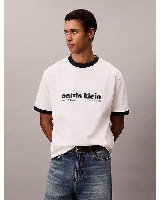 Calvin Klein Blue Jeans Logo Graphic Relaxed Ringer T-Shirt for men