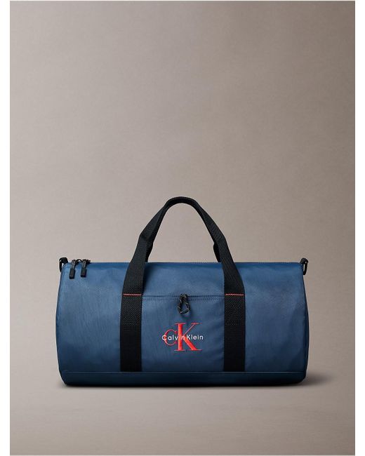 Calvin Klein Blue Monogram Logo Duffle Bag for men