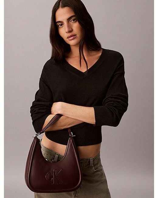 Calvin Klein Multicolor Embossed Monogram Crescent Bag