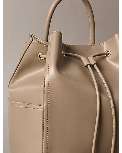 Calvin Klein Natural Monogram Drawstring Backpack