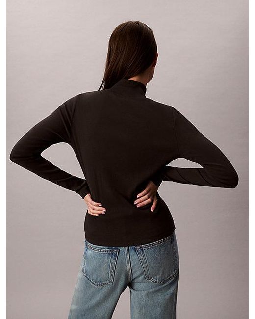 Calvin Klein Black Jeans Ribbed Cotton Turtleneck Top