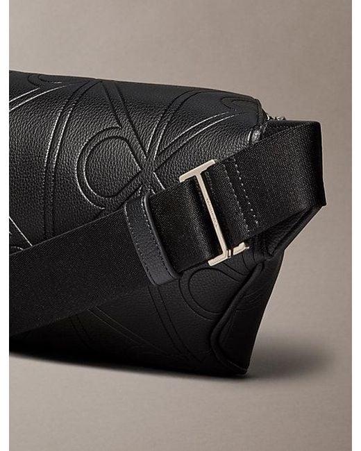 Calvin Klein Black Embossed Emblem Logo Bum Bag for men