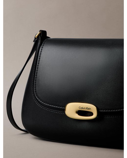 Calvin Klein Black Engraved Medium Flap Crossbody Bag