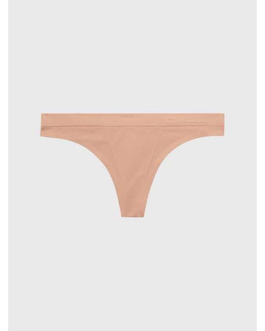 String Calvin Klein en coloris Natural