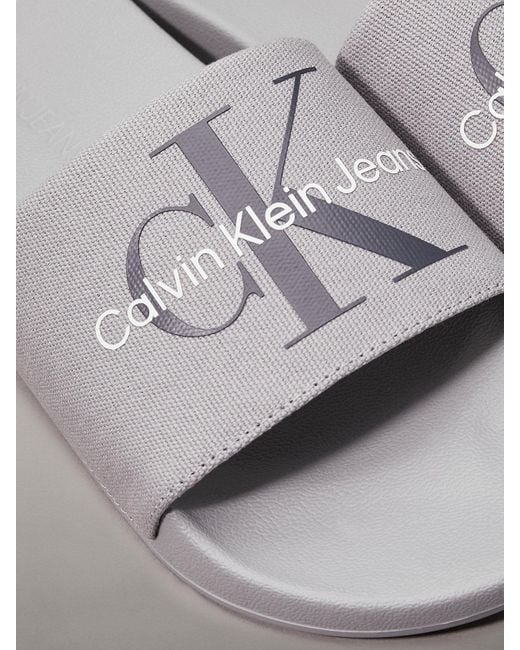 Calvin Klein Gray Canvas Sliders for men