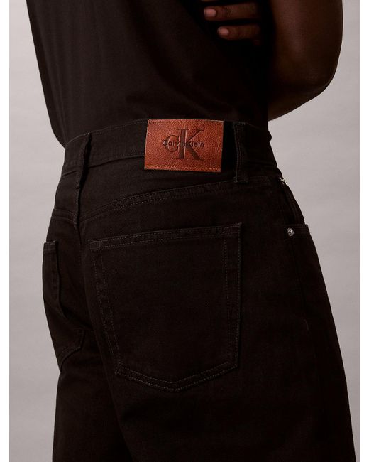 Jean Baggy Calvin Klein pour homme en coloris Black