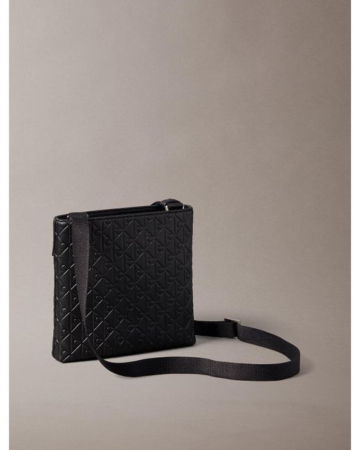 Calvin Klein Black Embossed Emblem Logo Flat Pack for men