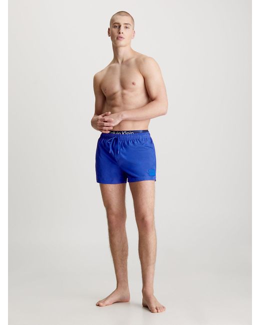 Short de bain court avec double ceinture - CK Steel Calvin Klein pour homme en coloris Blue