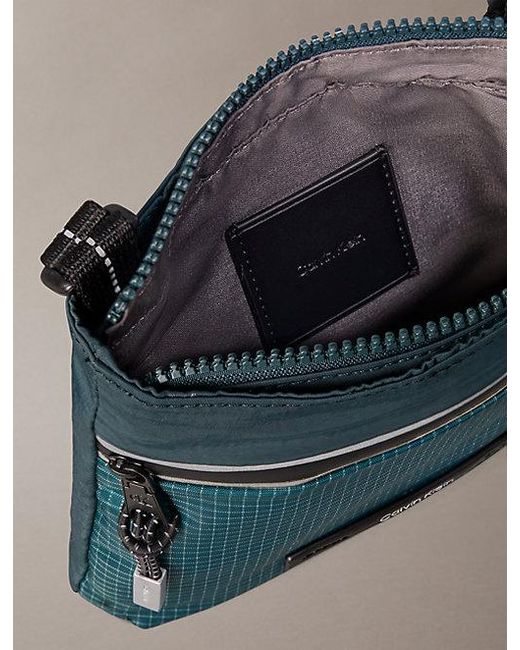 Calvin Klein Blue Striped Utility Zip Flat Pack for men
