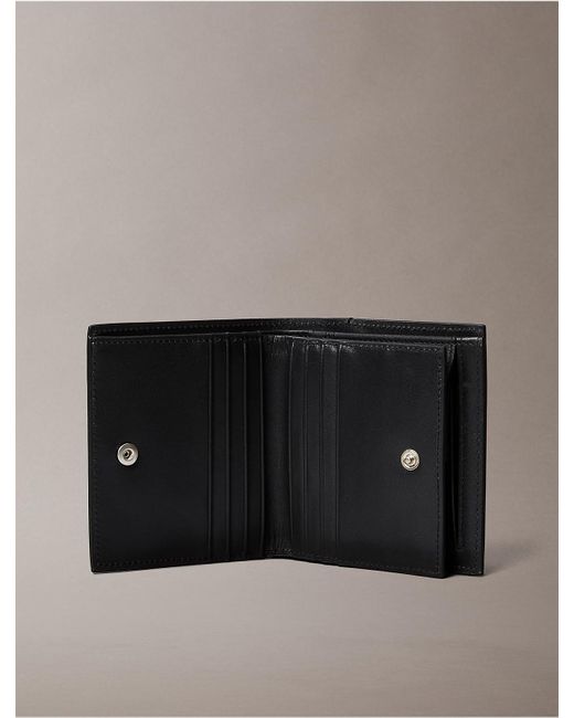 Calvin Klein Black Plaque Logo Trifold Wallet for men