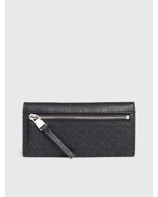 Grand portefeuille 3 volets anti-RFID avec logo Calvin Klein en coloris Gray