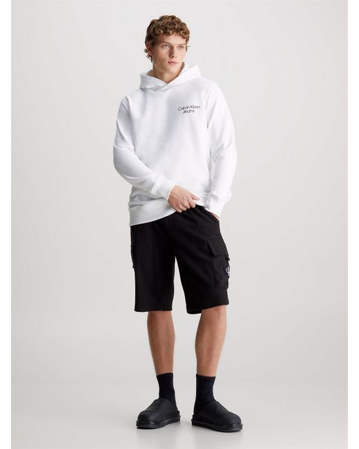 Sweat-shirt à capuche en tissu éponge avec logo graphique Calvin Klein pour homme en coloris White