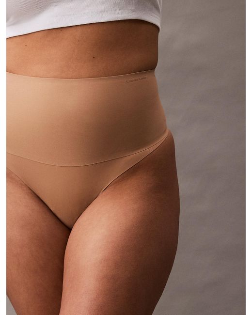 String Shapewear Calvin Klein en coloris Brown