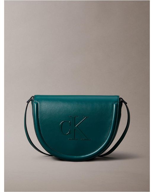 Calvin Klein Green Embossed Monogram Logo Saddle Bag