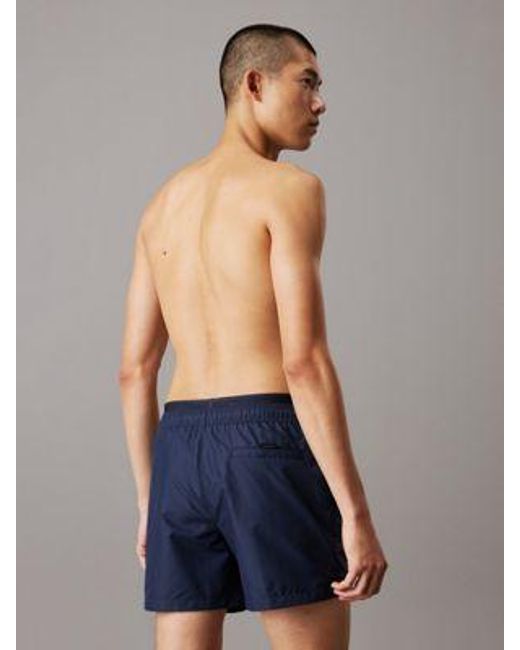 Bañador corto con cinturilla doble - CK Meta Legacy Calvin Klein de hombre de color Blue