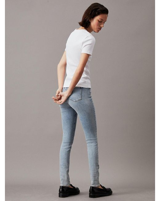 Jean skinny high rise Calvin Klein en coloris Blue