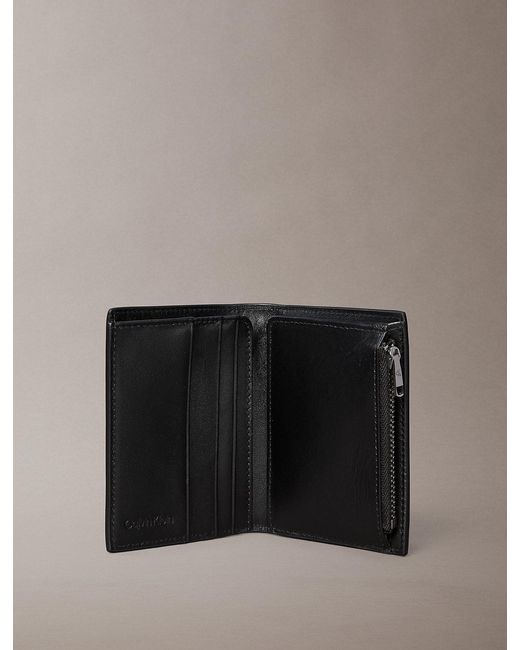 Calvin Klein Black Embossed Monogram Bifold Wallet for men