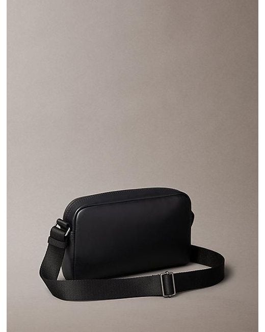 Calvin Klein Black Embossed Monogram Logo Camera Bag for men