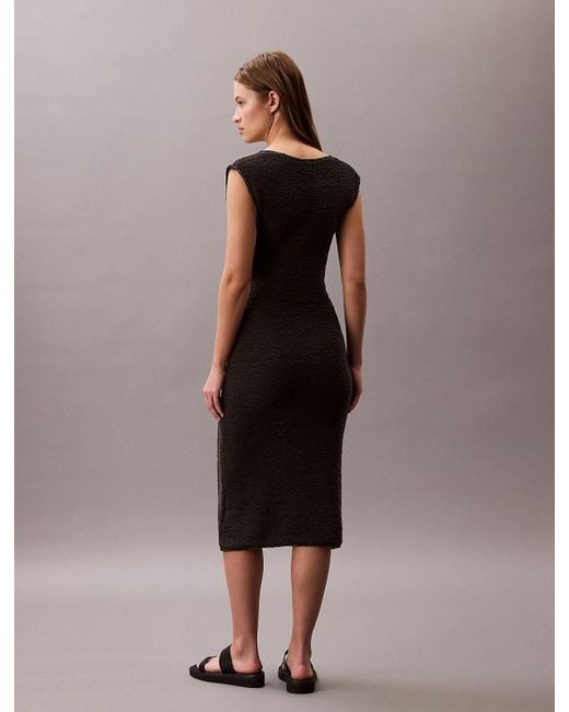 Robe Longueur Midi En Maille Transparente Calvin Klein en coloris Brown