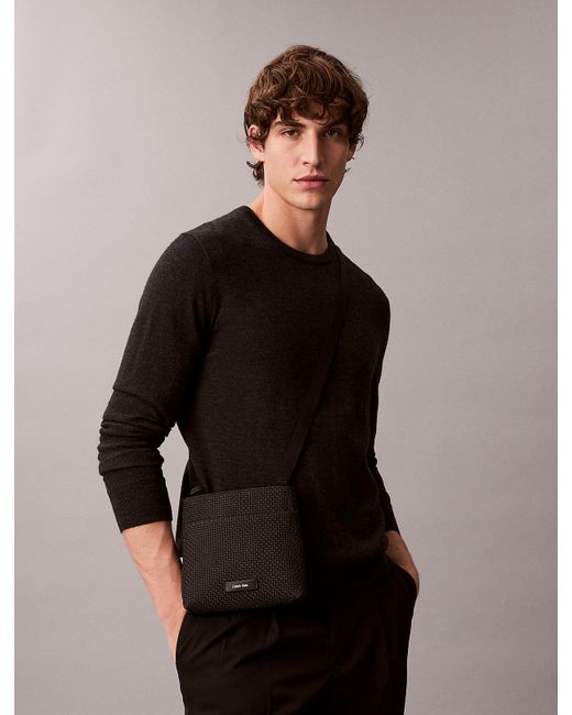 Calvin Klein Black Embossed Emblem Logo Flat Pack for men