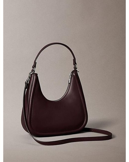 Calvin Klein Multicolor Embossed Monogram Crescent Bag
