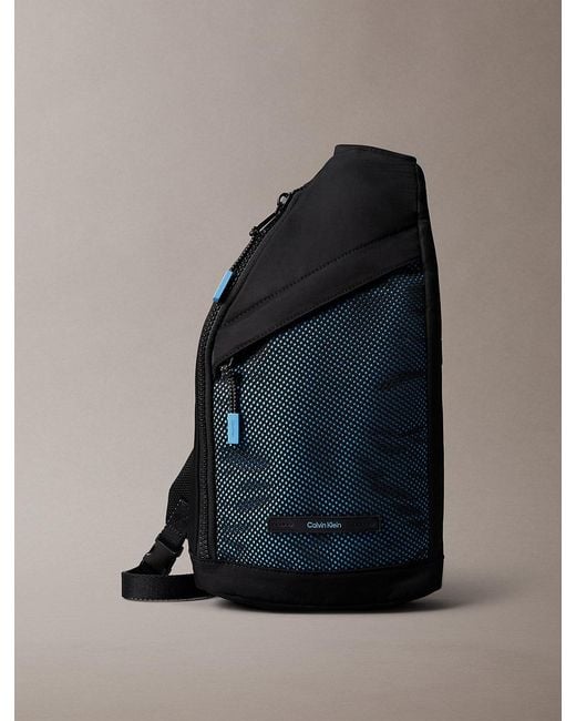 Calvin Klein Blue Mesh Front Sling Bag for men