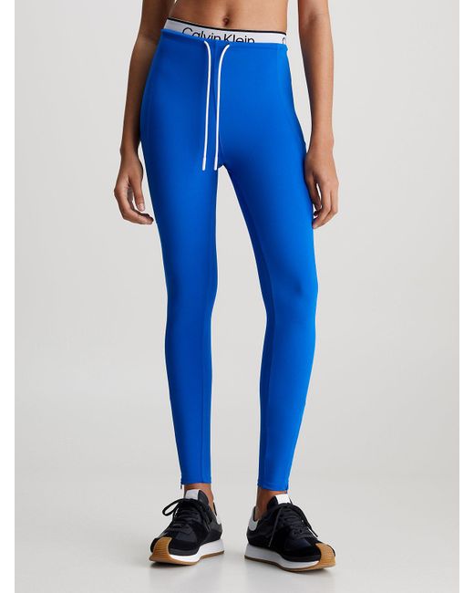 Legging de sport mi-long avec ceinture double Calvin Klein en coloris Blue