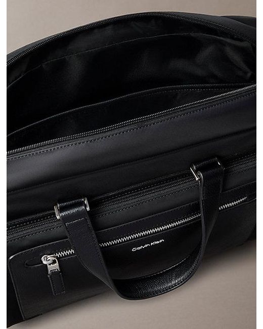Calvin Klein Black Raised Logo Slim Commuter Bag for men