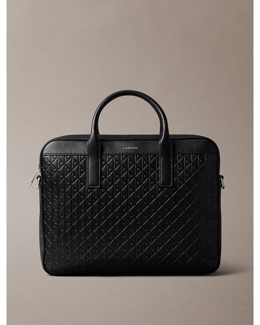 Calvin Klein Black Embossed Monogram Logo Commuter Bag for men