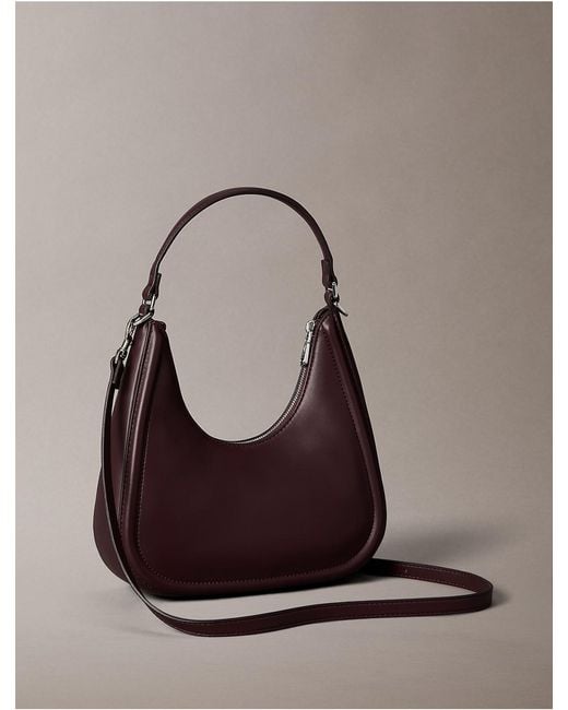 Calvin Klein Multicolor Embossed Monogram Crescent Bag