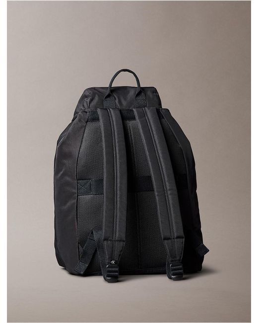 Calvin Klein Black Nylon Monogram Logo Top Flap Backpack for men