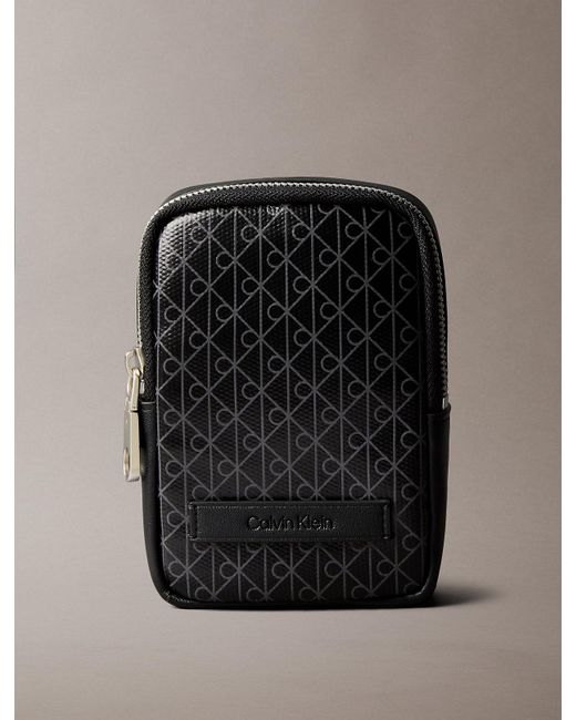 Calvin Klein Black Allover Monogram Logo Zip Pouch for men
