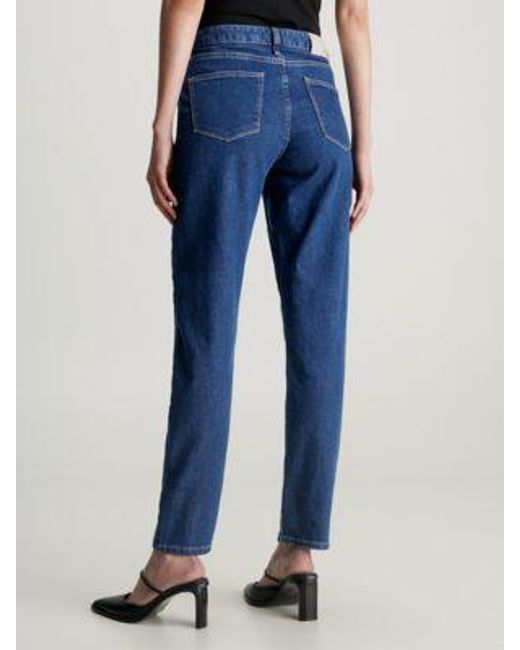 Mid Rise Slim Jeans Calvin Klein de color Blue