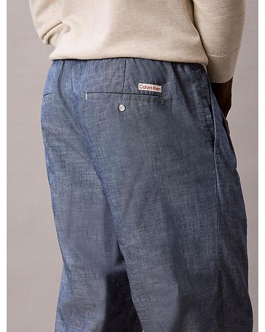 Calvin Klein Blue Jeans Cotton Chambray Drawstring Trousers for men