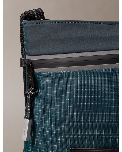 Calvin Klein Blue Striped Utility Zip Flat Pack for men