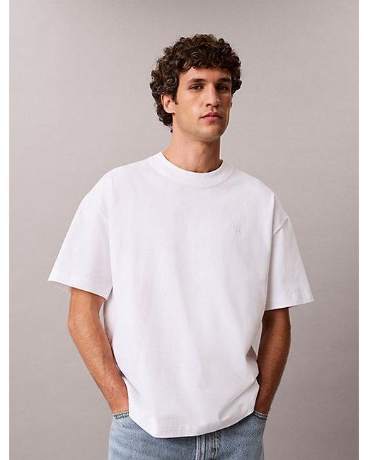 Calvin Klein Blue Jeans Oversized Embossed Logo T-Shirt for men