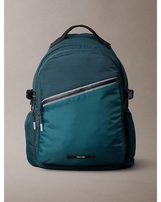 Calvin Klein Blue Striped Utility Zip Round Backpack for men