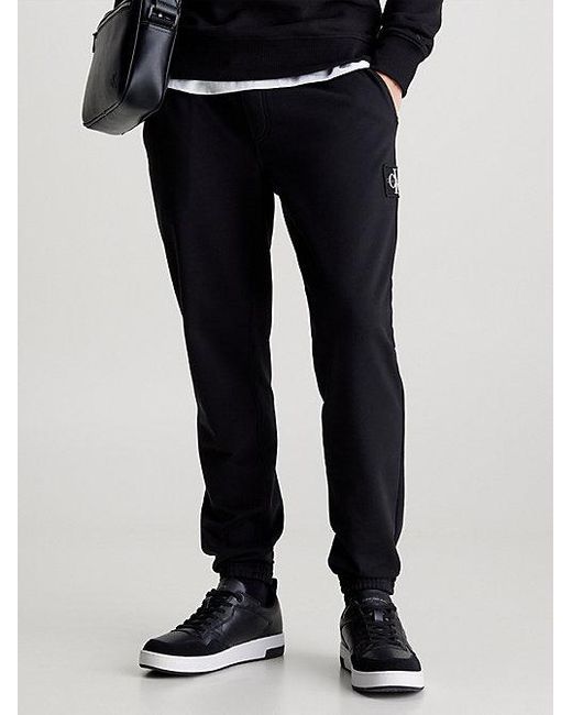 Pantalón de chándal skinny de felpa con insignia Calvin Klein de hombre de color Black