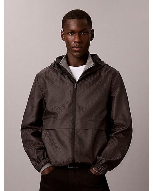 Calvin Klein Black Jeans All Over Logo Windbreaker Jacket for men