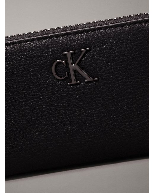 Portefeuille zippé anti-RFID Calvin Klein en coloris Black