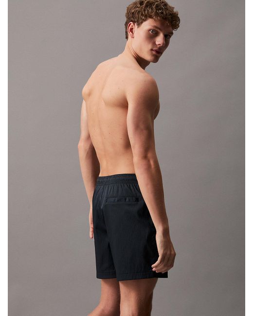 Short de bain mi-long indéchirable avec cordon de serrage Calvin Klein pour homme en coloris Black