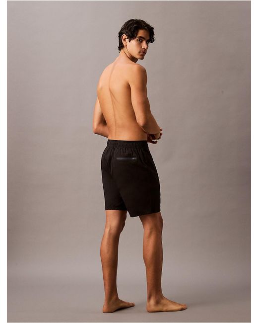 Calvin Klein Black Solid 7" Swim Shorts for men
