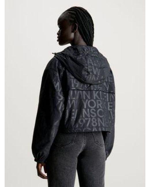 Chaqueta con capucha con logo all over Calvin Klein de hombre de color Black