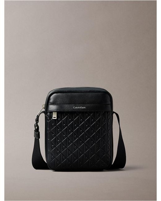 Calvin Klein Black Embossed Allover Monogram Reporter Bag for men