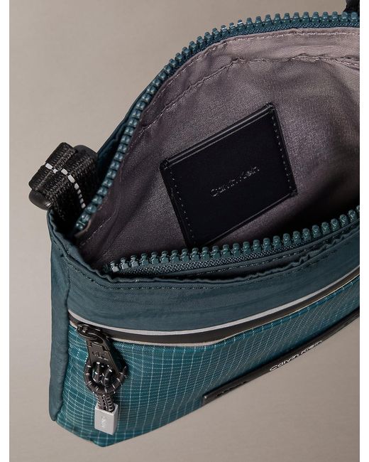 Calvin Klein Blue Striped Utility Zip Flat Pack for men