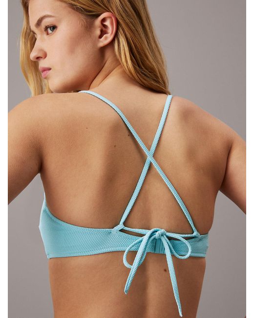 Haut de bikini brassière - CK Monogram Texture Calvin Klein en coloris Blue