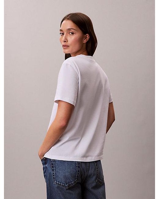 Calvin Klein White Jeans Logo Graphic Classic T-Shirt
