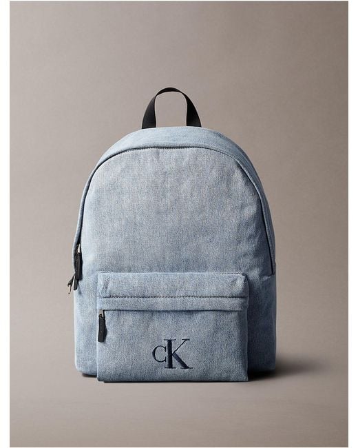 calvin klein blue leather backpack Sloan Mini - Slim Design, Built-In Sleeve Fits 11